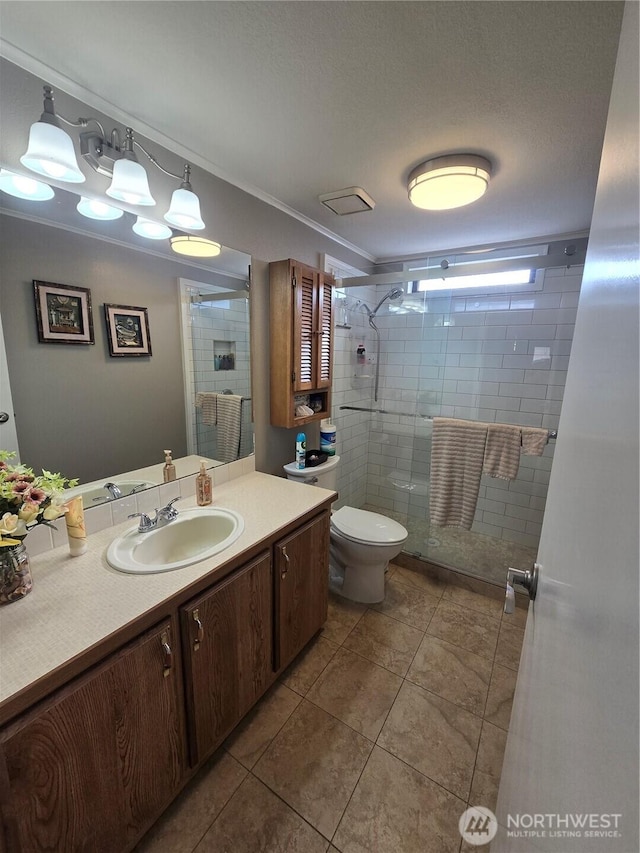 836 E Harman Way E Unit 62, Orting, WA 98360 - bathroom with a stall shower, vanity, tile patterned flooring, and a textured ceiling