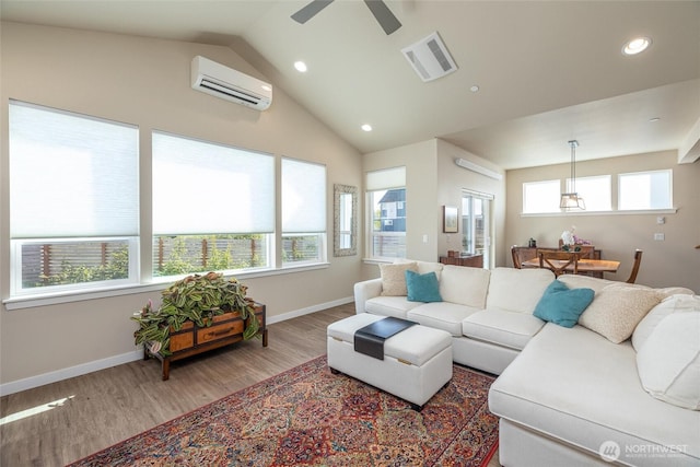 707 Northview St, Bellingham, WA 98226 - living area with a wall mounted AC, healthy amount of natural light, recessed lighting, wood finished floors, and ceiling fan