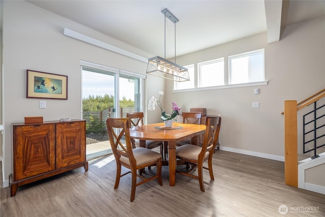 707 Northview St, Bellingham, WA 98226 - dining room featuring plenty of natural light, wood finished floors, and a chandelier
