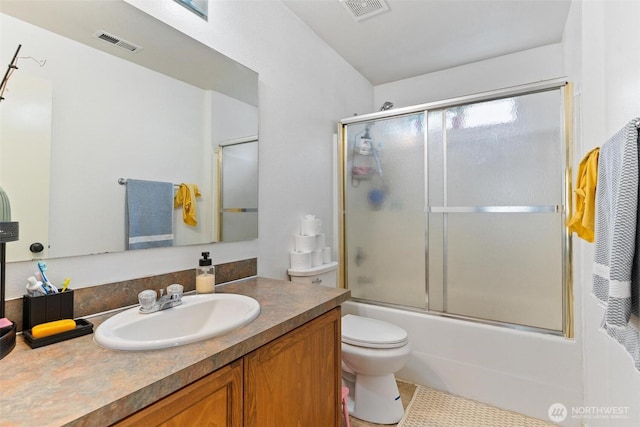 4212 Edgewater Blvd NE, Lacey, WA 98516 - full bath featuring vanity, shower / bath combination with glass door, and tile patterned floors