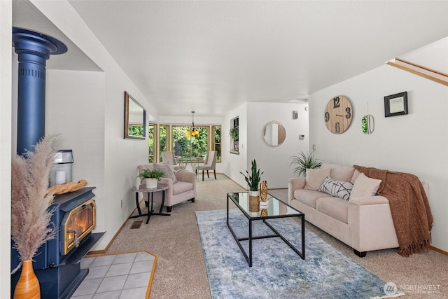 2735 Fordham Ct SE, Lacey, WA 98503 - living room with a wood stove and light carpet