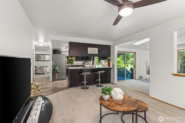 2735 Fordham Ct SE, Lacey, WA 98503 - living room featuring plenty of natural light, ceiling fan, and light carpet