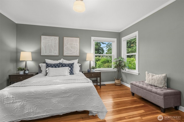 1230 NE 100th St, Seattle, WA 98125 - bedroom featuring wood finished floors and crown molding