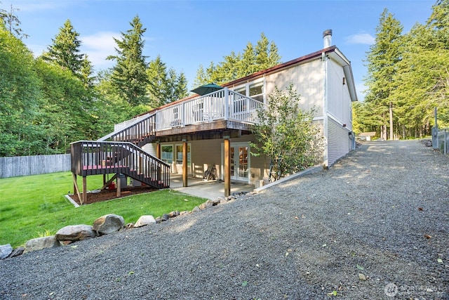 121 E Willapa Rd, Shelton, WA 98584 - rear view of property featuring a wooden deck, french doors, stairs, and a patio area