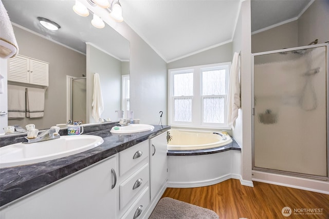121 E Willapa Rd, Shelton, WA 98584 - bathroom featuring a bath, double vanity, a shower stall, ornamental molding, and wood finished floors