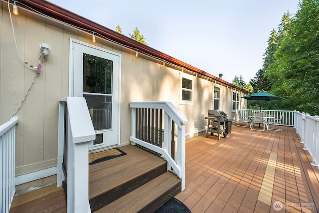 121 E Willapa Rd, Shelton, WA 98584 - wooden terrace featuring outdoor dining area and a grill