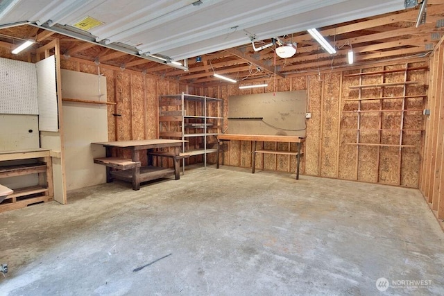 140 Fleming Dr, Sequim, WA 98382 - garage featuring a workshop area and a garage door opener