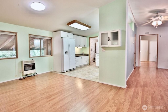 140 Fleming Dr, Sequim, WA 98382 - unfurnished living room featuring heating unit, light wood-type flooring, and a ceiling fan