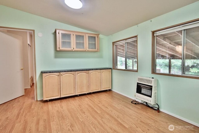140 Fleming Dr, Sequim, WA 98382 - unfurnished dining area with heating unit, lofted ceiling, and light wood-style flooring