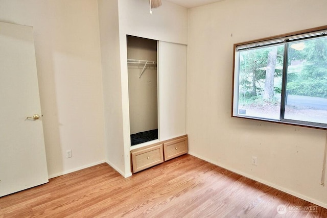 140 Fleming Dr, Sequim, WA 98382 - unfurnished bedroom featuring light wood finished floors and a closet