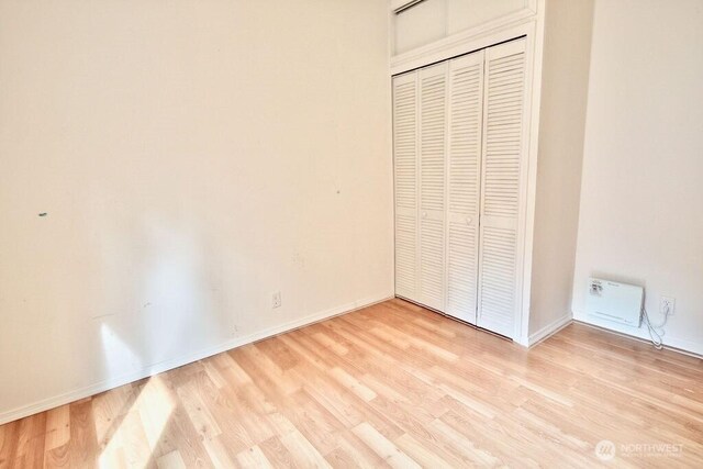 140 Fleming Dr, Sequim, WA 98382 - unfurnished bedroom featuring light wood-style floors and a closet