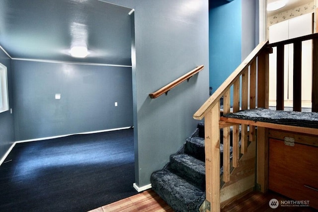 140 Fleming Dr, Sequim, WA 98382 - stairway with baseboards and wood finished floors