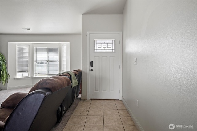 620 N Larkspur, Othello, WA 99344 - entryway with baseboards and light tile patterned floors
