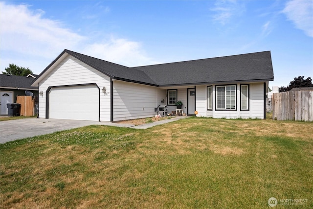620 N Larkspur, Othello, WA 99344 - single story home with a garage, concrete driveway, and covered porch