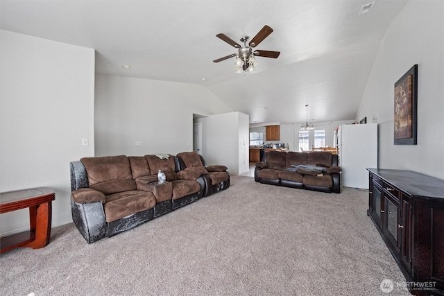 620 N Larkspur, Othello, WA 99344 - living area with a ceiling fan, light carpet, and lofted ceiling