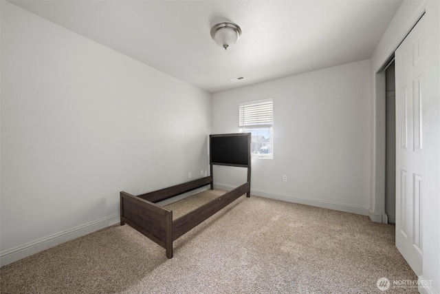 620 N Larkspur, Othello, WA 99344 - unfurnished bedroom with carpet flooring and a closet