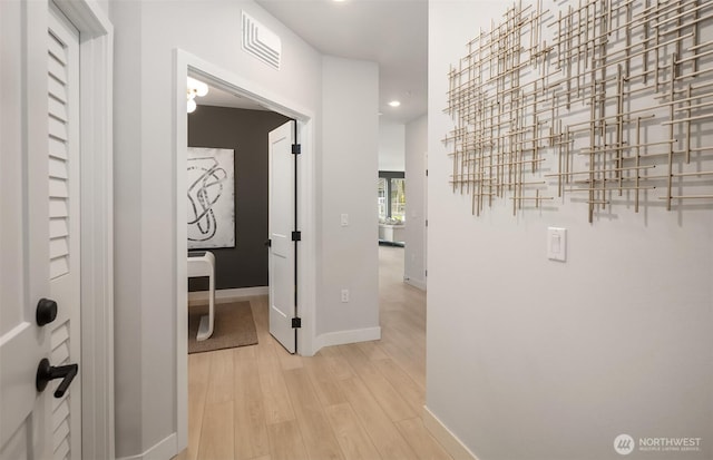 18226 68th Ave NE Unit 502, Kenmore, WA 98028 - hall with light wood-style floors and recessed lighting