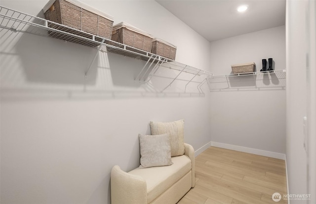 18226 68th Ave NE Unit 502, Kenmore, WA 98028 - spacious closet featuring wood finished floors