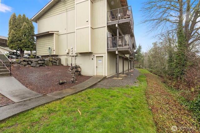 3400 Narrows View Ln NE Unit 204, Bremerton, WA 98310 - view of property exterior featuring a balcony