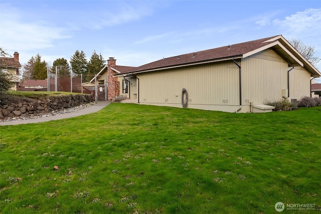 3400 Narrows View Ln NE Unit 204, Bremerton, WA 98310 - view of property exterior featuring a yard and a chimney