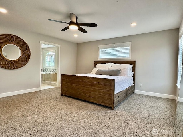 885 N Squire Dr, Ridgefield, WA 98642 - carpeted bedroom with connected bathroom, a ceiling fan, and recessed lighting