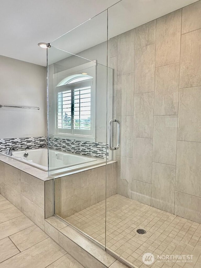 885 N Squire Dr, Ridgefield, WA 98642 - bathroom featuring a stall shower and a garden tub