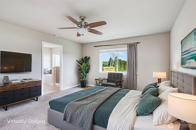 7336 Ashdown Ln SE, Olympia, WA 98513 - bedroom with light colored carpet, a ceiling fan, and ensuite bath