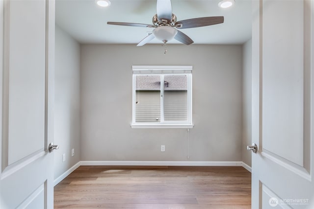 7336 Ashdown Ln SE, Olympia, WA 98513 - spare room with wood finished floors, a ceiling fan, and recessed lighting