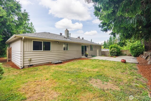 4638 148th Ave SE, Bellevue, WA 98006 - rear view of house featuring a chimney and a patio area