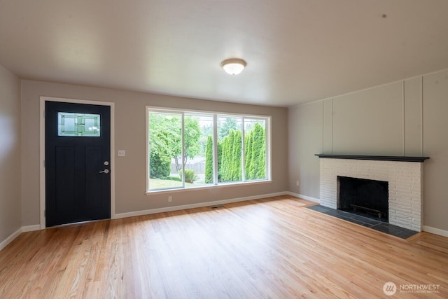 4638 148th Ave SE, Bellevue, WA 98006 - unfurnished living room featuring wood finished floors and a fireplace
