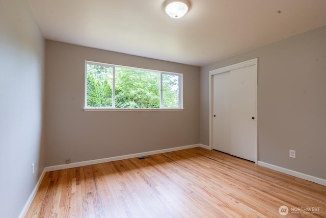 4638 148th Ave SE, Bellevue, WA 98006 - empty room featuring wood finished floors and baseboards