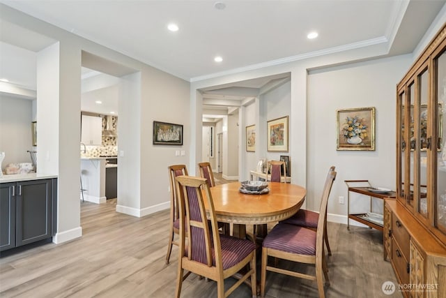 520 6th Ave Unit 2001, Kirkland, WA 98033 - dining area featuring recessed lighting, light wood-style flooring, and ornamental molding