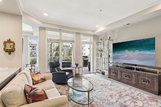520 6th Ave Unit 2001, Kirkland, WA 98033 - living room with crown molding, a tray ceiling, recessed lighting, and wood finished floors