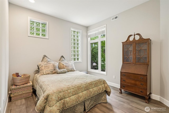 520 6th Ave Unit 2001, Kirkland, WA 98033 - bedroom with wood finished floors and recessed lighting