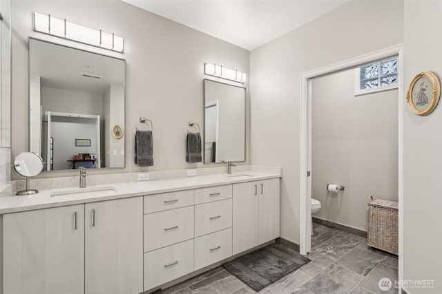 520 6th Ave Unit 2001, Kirkland, WA 98033 - full bath featuring marble look tile flooring and double vanity