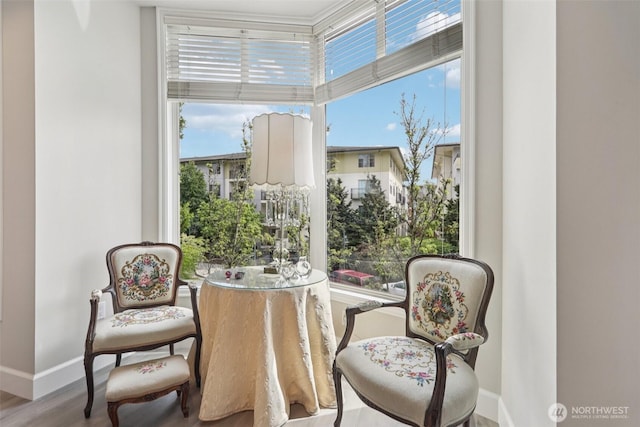 520 6th Ave Unit 2001, Kirkland, WA 98033 - sitting room featuring plenty of natural light and wood finished floors