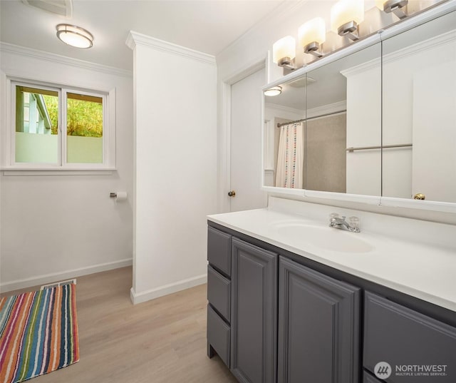 18304 Mclean Rd SW, Vashon, WA 98070 - full bathroom featuring wood finished floors, vanity, and ornamental molding