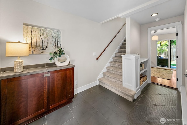 4314 Linden Ave N, Seattle, WA 98103 - foyer entrance with stairs, recessed lighting, and dark tile patterned floors