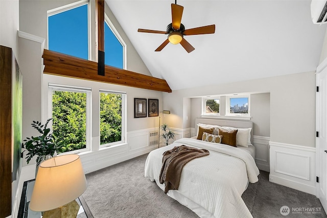 4314 Linden Ave N, Seattle, WA 98103 - carpeted bedroom with an AC wall unit, a wainscoted wall, lofted ceiling, a decorative wall, and a ceiling fan