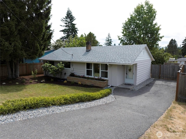 18111 46th Ave S, Seatac, WA 98188 - ranch-style home featuring asphalt driveway, roof with shingles, and a chimney