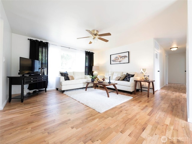 18111 46th Ave S, Seatac, WA 98188 - living area featuring light wood finished floors and a ceiling fan