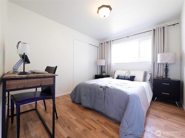 18111 46th Ave S, Seatac, WA 98188 - bedroom with a closet and wood finished floors