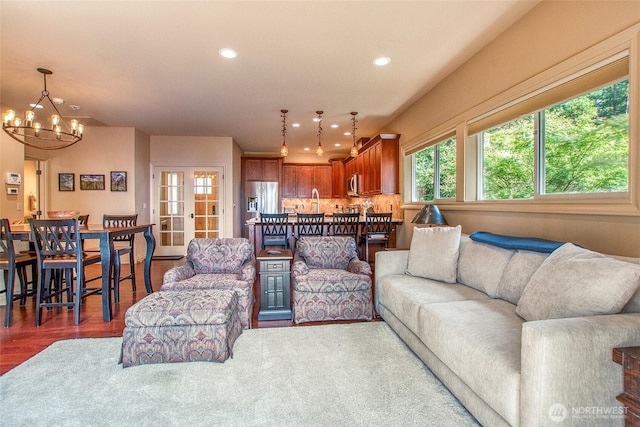 211 Geer Ln, Orcas Island, WA 98245 - living room featuring a chandelier and recessed lighting
