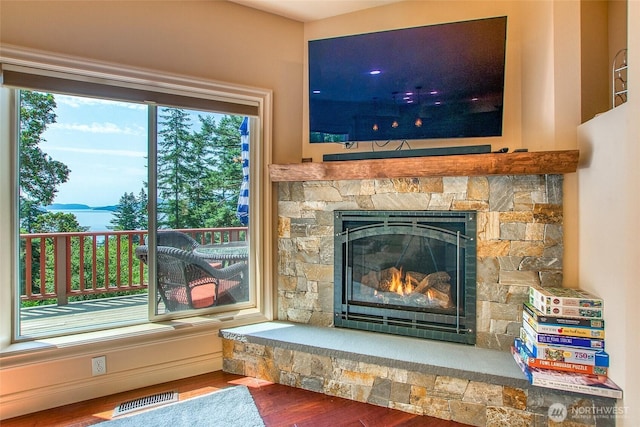 211 Geer Ln, Orcas Island, WA 98245 - detailed view of wood finished floors and a stone fireplace