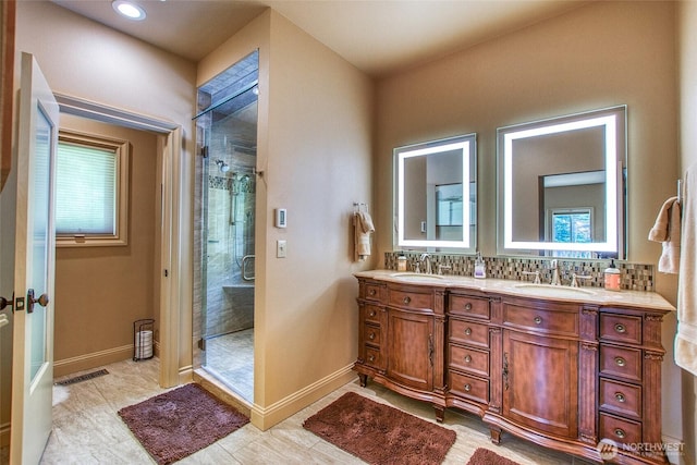211 Geer Ln, Orcas Island, WA 98245 - full bath with double vanity, a stall shower, healthy amount of natural light, tasteful backsplash, and recessed lighting
