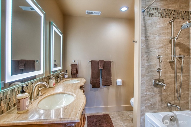 211 Geer Ln, Orcas Island, WA 98245 - full bath with double vanity, backsplash, tub / shower combination, tile patterned floors, and recessed lighting