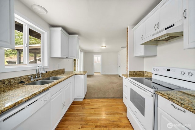2530 SW 325th Pl, Federal Way, WA 98003 - kitchen with white appliances, under cabinet range hood, white cabinets, light wood-type flooring, and stone countertops