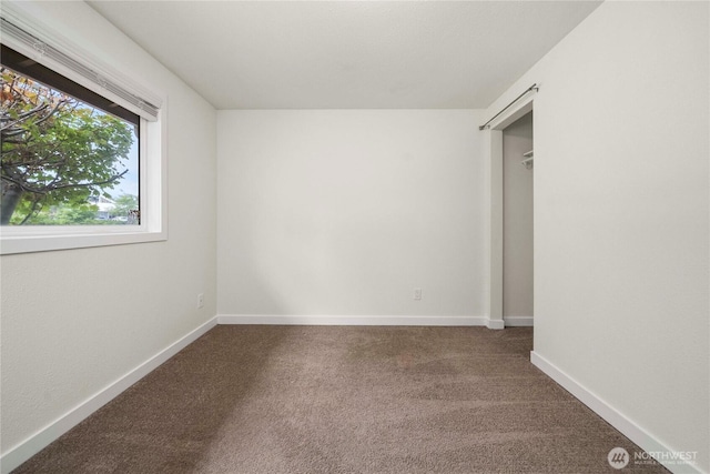 2530 SW 325th Pl, Federal Way, WA 98003 - unfurnished bedroom with dark colored carpet and baseboards