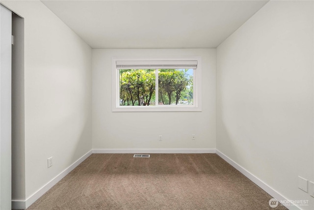 2530 SW 325th Pl, Federal Way, WA 98003 - spare room featuring dark carpet and baseboards