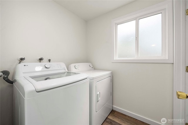 2530 SW 325th Pl, Federal Way, WA 98003 - laundry area featuring washing machine and clothes dryer and wood finished floors